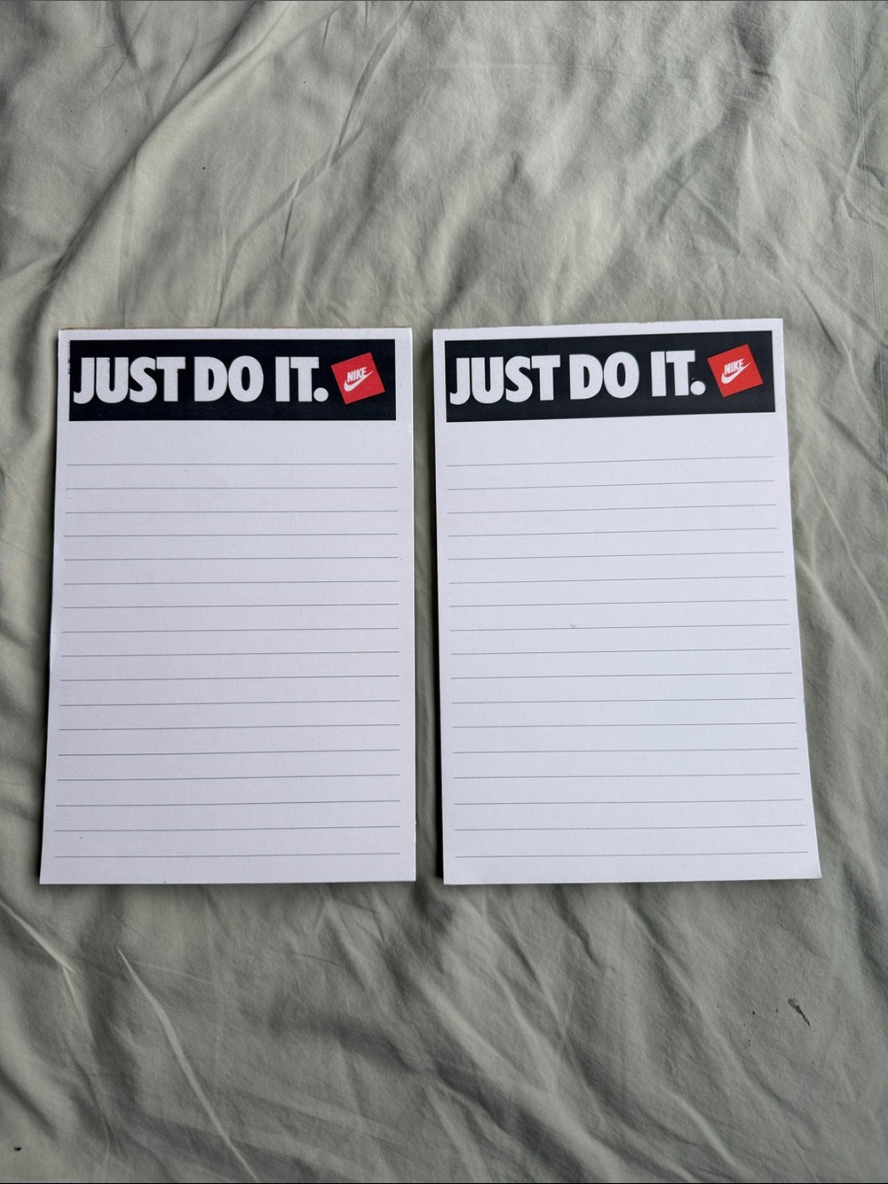 Vintage Nike White Lined Notepads with Black Header and Red Swoosh